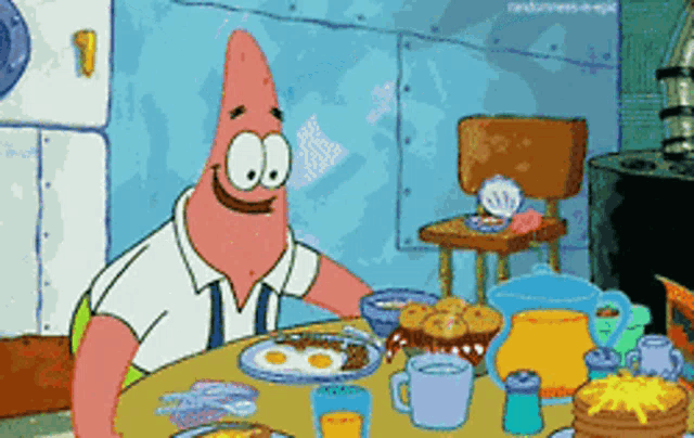 patrick star from spongebob is sitting at a table with a plate of food