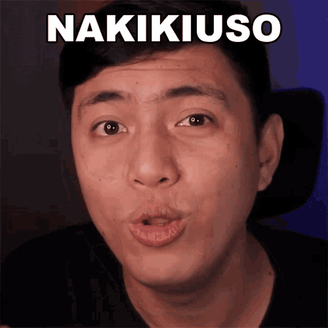 a close up of a man 's face with the word nakikiuso above him