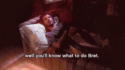 a man laying on a couch with the words well you 'll know what to do bret