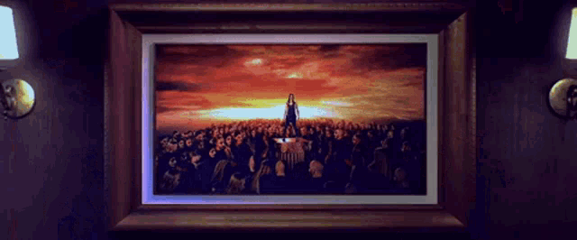a framed painting of a woman standing in front of a crowd
