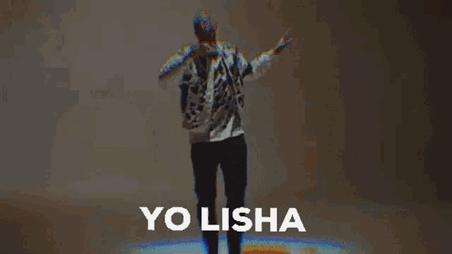 a man is dancing with the word yo lisha behind him