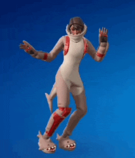 a person in a shark costume is walking on a blue background .