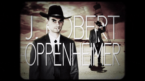 a man in a cowboy hat stands in front of the name j.robert oppenheimer