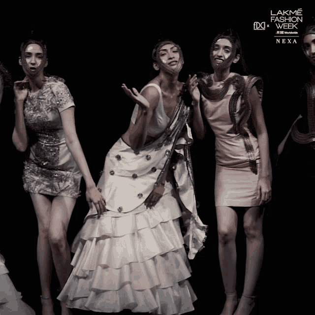 a poster for lakme fashion week shows a group of women