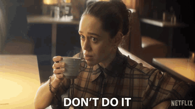 a woman drinking a cup of coffee with a netflix logo behind her