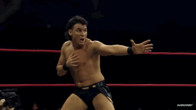 two wrestlers are in a ring with the word impact on the screen