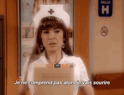 a woman in a nurse 's hat is holding a folder in front of a sign that says salle h.