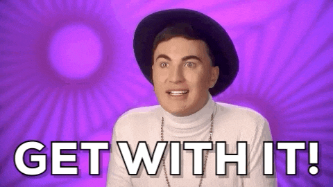 a man wearing a hat and a white turtleneck is saying get with it .