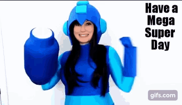 a woman dressed in a mega man costume is holding a mega man glove .