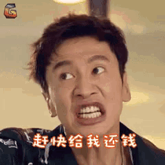 a man is making a funny face with his mouth open and chinese writing on his face .