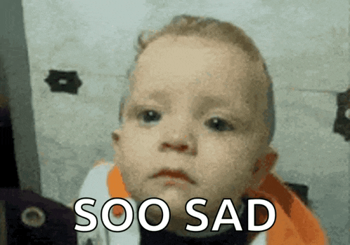 a baby with a sad look on his face and the words soo sad written below him