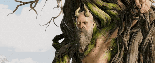 a statue of a man with horns and a beard