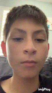 a close up of a person 's face with the words imgplay on the bottom right