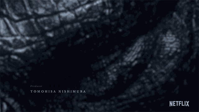 a close up of a dark background with netflix written on the bottom