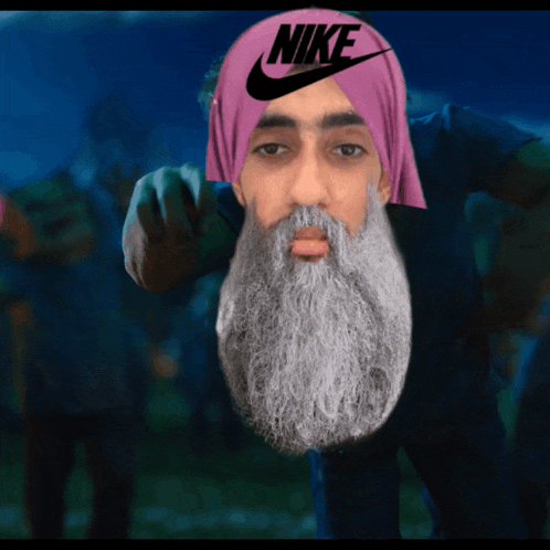 a man with a beard is wearing a nike headband