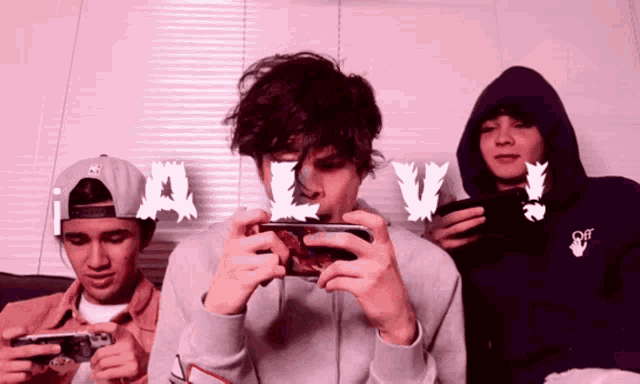 a group of young men are playing a video game with the words a lv written on the screen