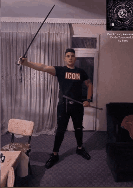 a man in an icon shirt holds a sword over his head
