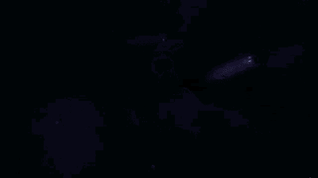 a man in a kimono is flying through the air in a futuristic city .
