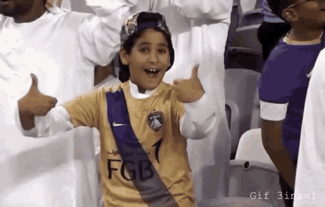Kid Thumbs Up GIF - Kid Thumbs Up Football Fan GIFs