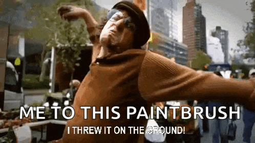 a man is throwing a paintbrush in the air and says `` me to this paintbrush i threw it on the ground '' .