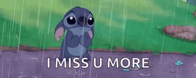 a cartoon character is standing in the rain with the words `` i miss u more '' written on it .