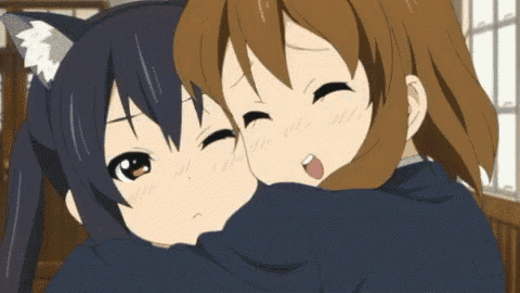 two anime girls hugging each other and one has a cat ear on her head