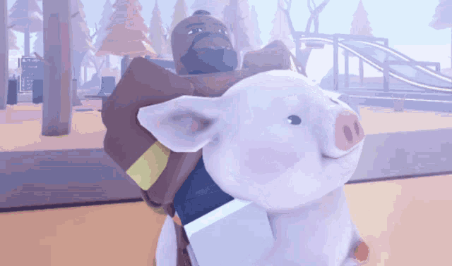 a man is carrying a pig on his back in a park