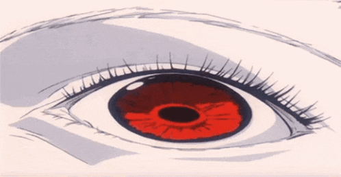 a close up of a person 's eye with red iris