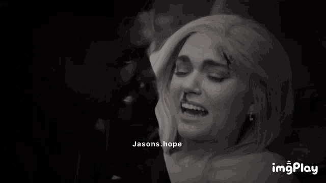 a black and white photo of a man and a woman with jasons.hope written on the bottom