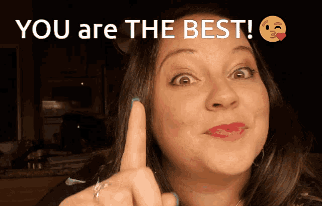 a woman giving a thumbs up with the words " you are the best " behind her