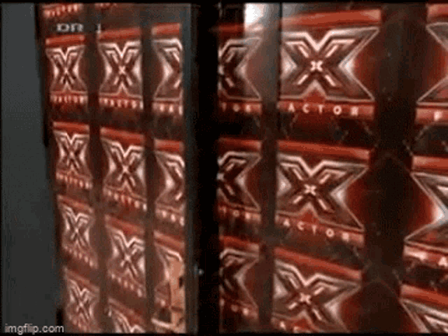 a row of x factor boxes are lined up