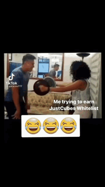 a man and a woman are laughing in a living room