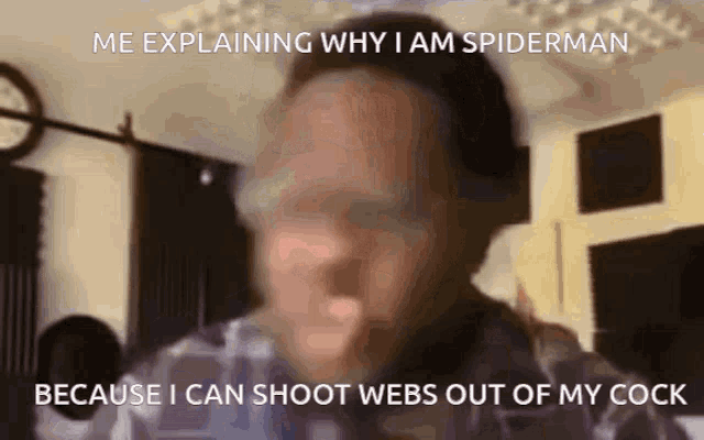 a blurry picture of a man explaining why he is spider man