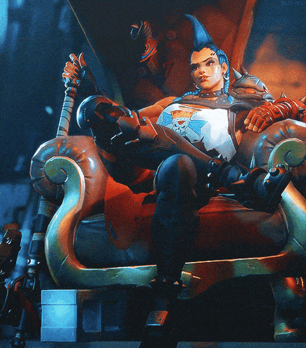 a man with a mohawk sits in a chair with the word bld-ipl on the bottom