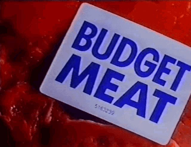 a close up of a sticker that says budget meat