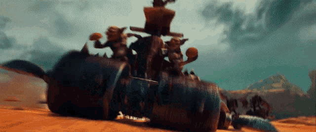 a group of goblins are riding on the back of a monster vehicle