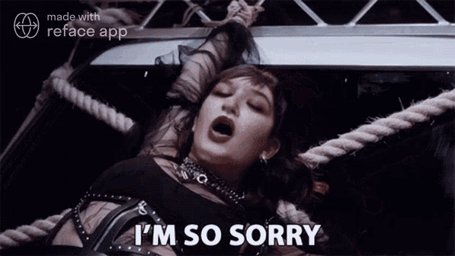a woman is laying on a rope with her mouth open and says i 'm so sorry