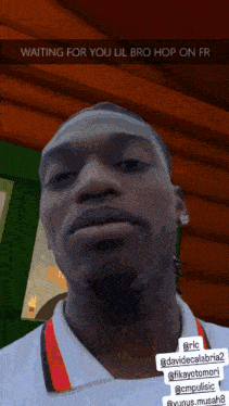 a man in a white shirt is waiting for someone to hop on
