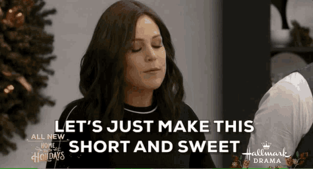 a woman says let 's just make this short and sweet in front of a christmas tree .