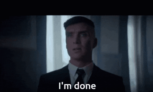 a man in a suit and tie says i 'm done .