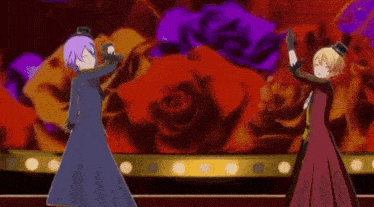 two anime characters are dancing on a stage .