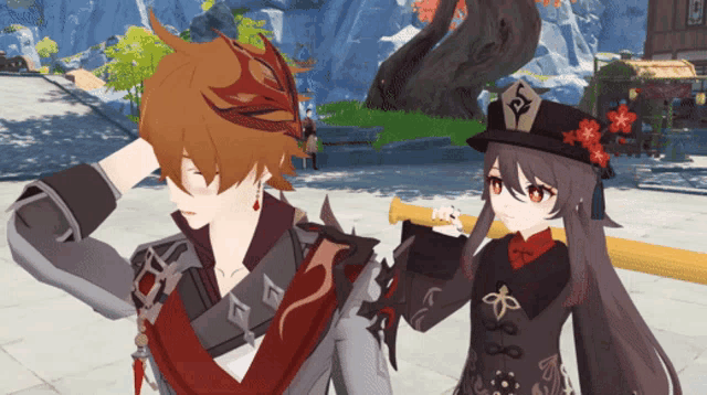 a man and a girl are standing next to each other and the girl has a hat with the letter p on it