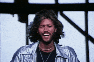Bee Gees Barry Gibb GIF - Bee Gees Barry Gibb Stayin Alive GIFs