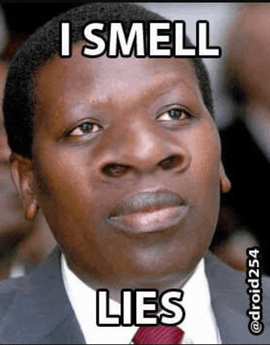 a man in a suit and tie with a big nose .
