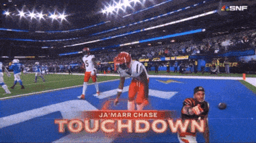 ja 'marr chase touchdown is displayed on a screen during a football game