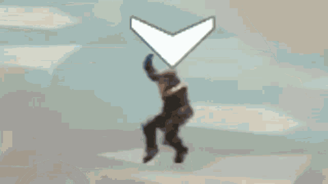 a man is standing in front of a blue arrow pointing down