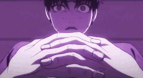 a close up of a person with their hands folded