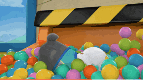 a cartoon drawing of a ball pit with a yellow and black striped barrier