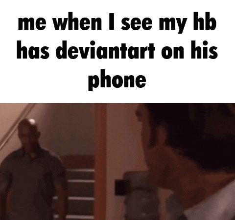 a man is standing on a set of stairs looking at another man who is standing on a set of stairs .
