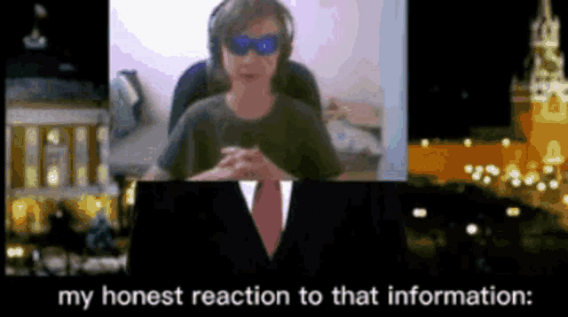 a video of a man in a suit and tie with the words my honest reaction to that information written below him